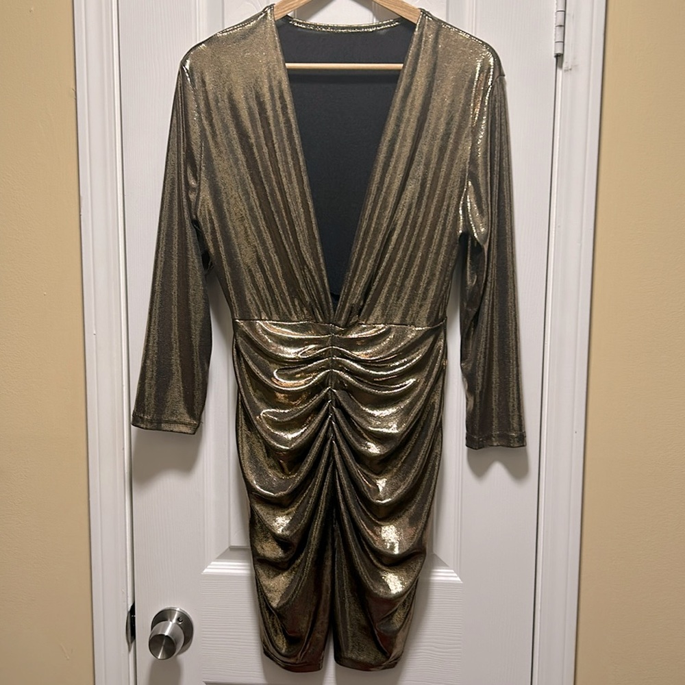 Gold lame shimmer cocktail dress. Deep v-neck front long sleeves